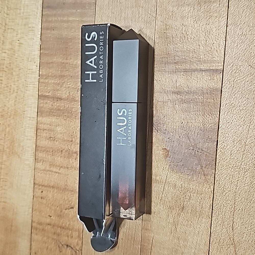 Haus labs lip gloss in "chaser"